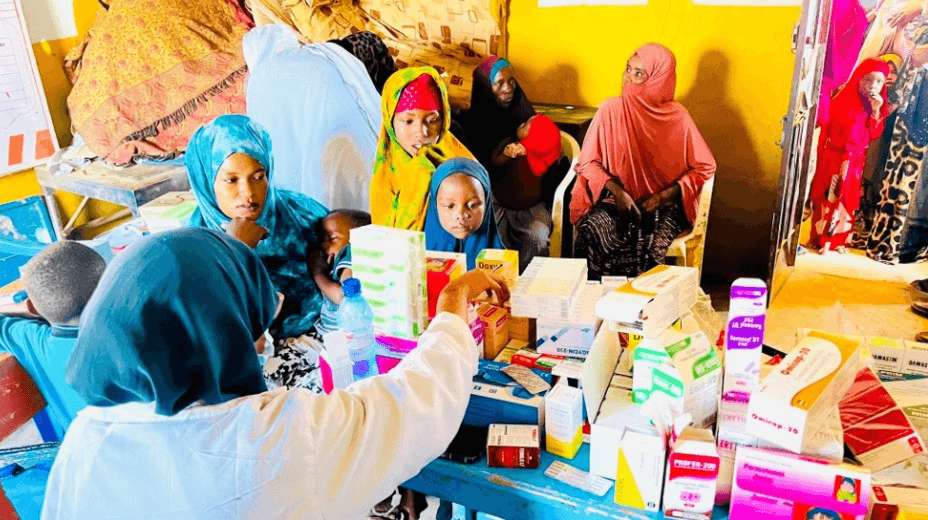 Health worker distributing supplies in a community clinic